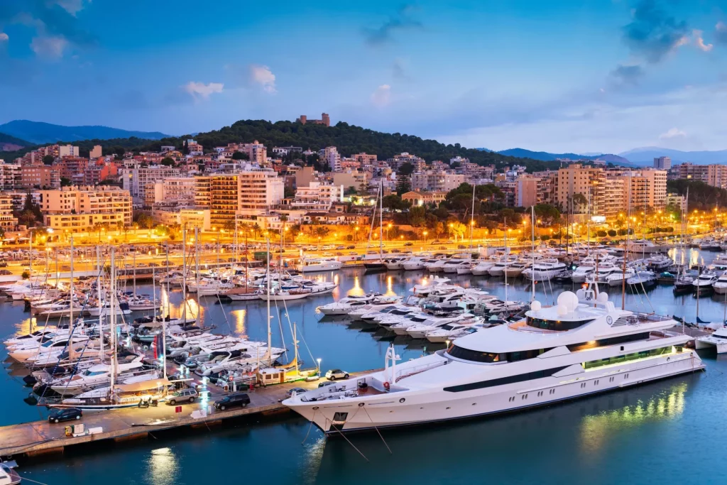 Palma de Mallorca, Spain skyline at the port with yachts in the early morning.