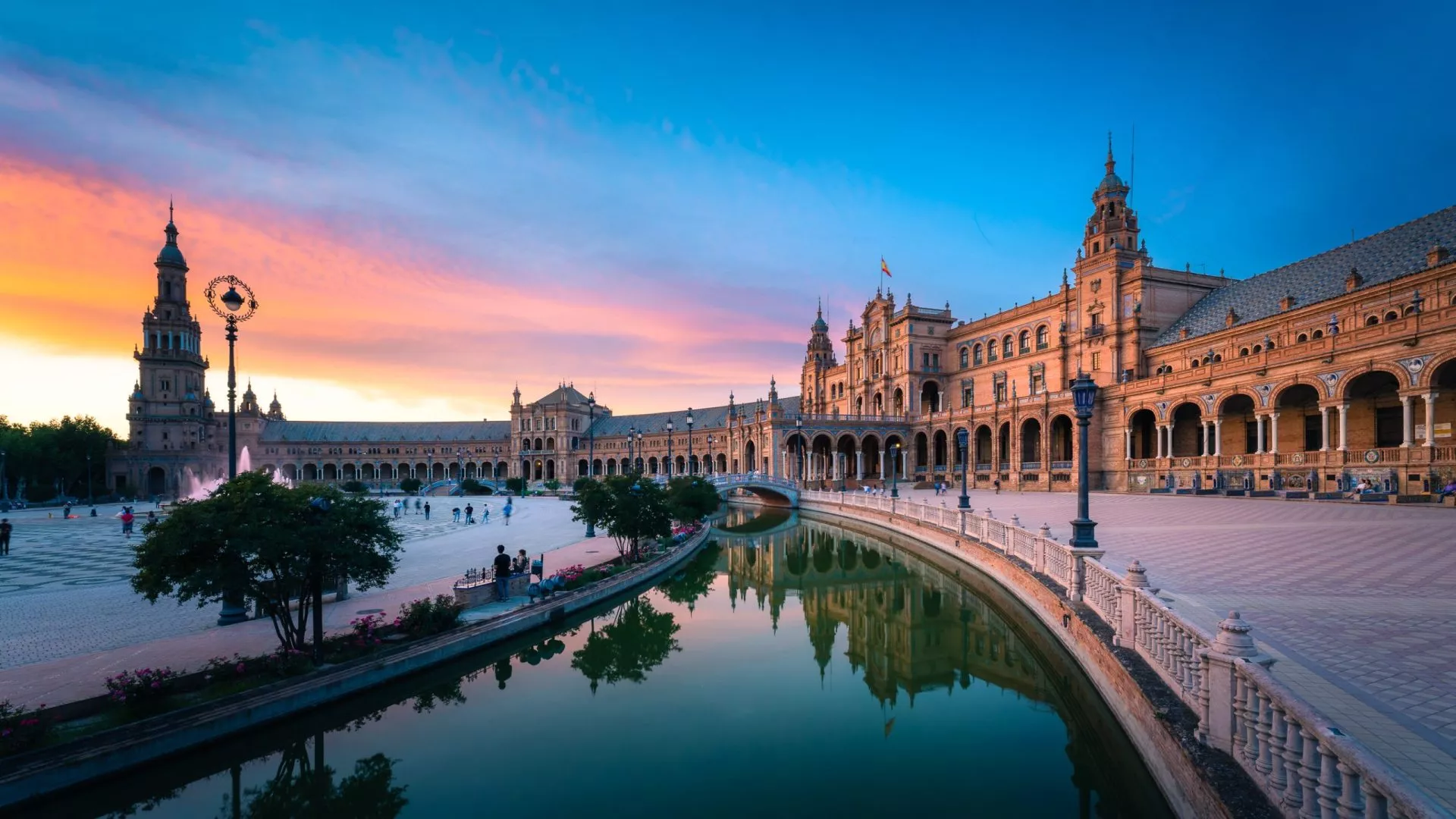 Plaza de España in Seville with Dramatic Colorful Clouds at Sunset, Andalusia, Spain
